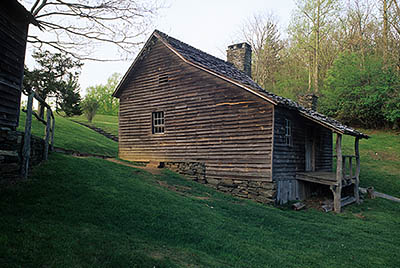 The Blue Ridge Parkway, Doughton Park, Brinager Cabin. Front view, in dusk light. Location: NC, Wilkes County. [ref. to #226.058]