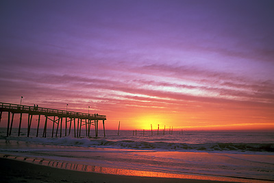 Sunrise from the beach; view towards Johnnie Mercer Fishing Pier. Location: NC, New Hanover County, Wilimington Area, Wrightsville Beach. [ref. to #233.232]
