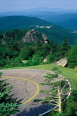 NC: Avery County, Linville Area, Grandfather Mountain Park, Switchbacks on approach road, mid-way up mountain. View east towards Grandfather Mountains Highlands Games, in bkgd. [Ask for #235.069.]