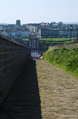 ENG: Yorkshire & Humberside Region, North Yorkshire, North Yorkshire Coast, Whitby, Abbey Steps, Stone steps from town center to the abbey; view from the top towards the town. Part of the Cleveland Way LDP [Ask for #270.147.]